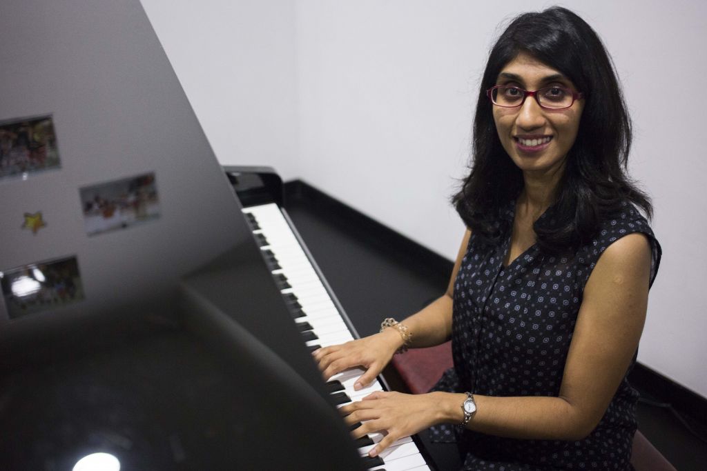 Deaf in one ear, part-time piano teacher aims to get a diploma in 2018