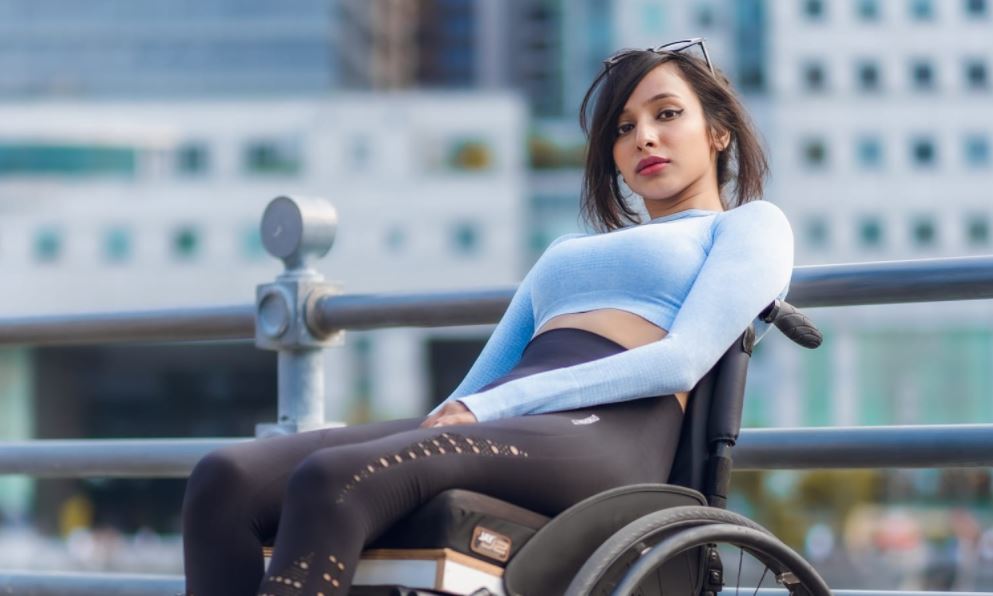 Photo shows Fathima Zohra on a wheelchair